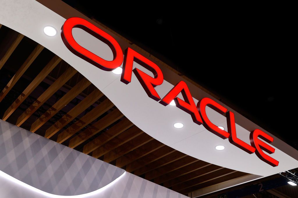 The Oracle logo appears atop a building.